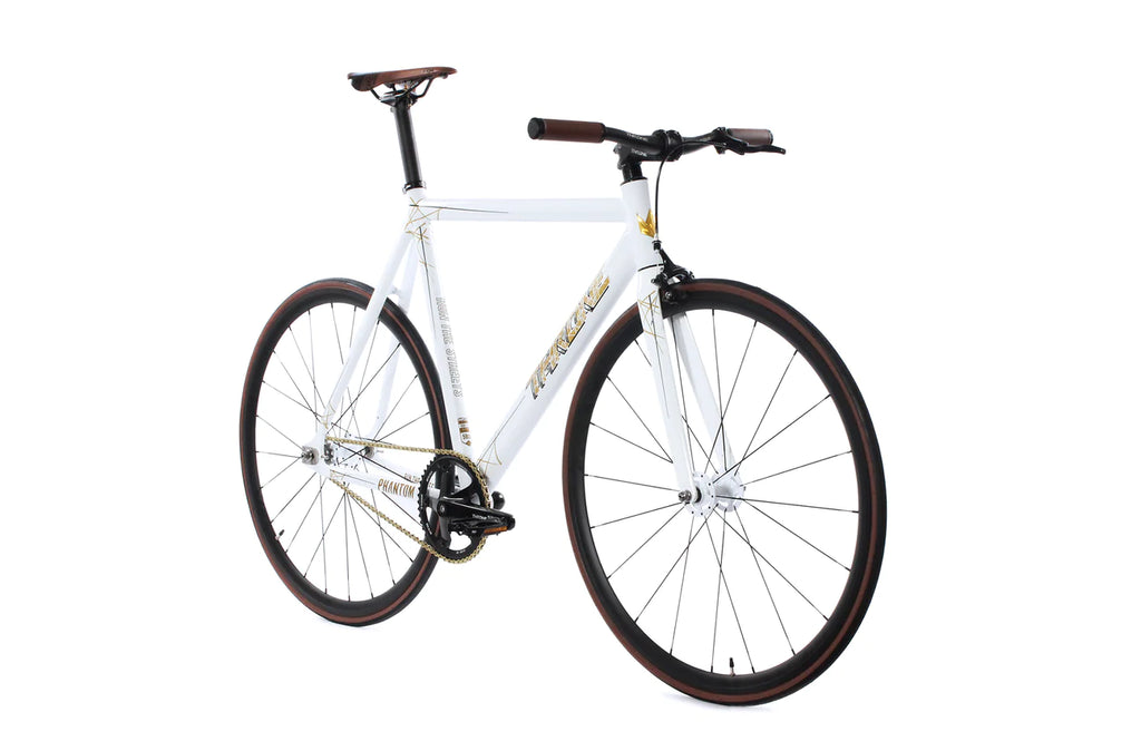 Gold and white online bike